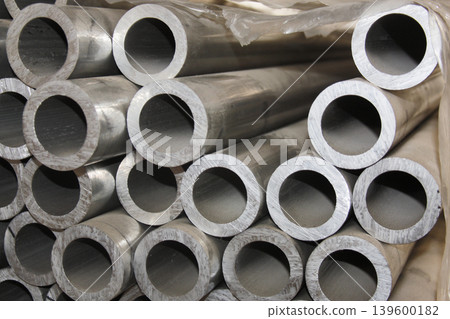 Metal steel pipe for construction materials, aluminium or stainless steel products on a factory or warehouse. 139600182