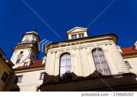 Astronomical Tower of the Klementinum in Prague with Atlant statue holding heavens, Czech Republic, clear blue sky, sunny day 139600267