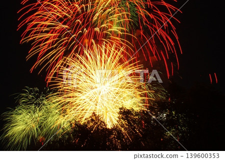 Festive multi-colored fireworks on a black background Festive multi-colored fireworks on a black background 139600353