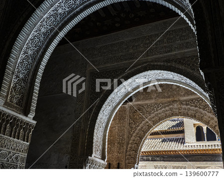 Moorish Archways and Carved Stucco in the Nasrid Palace Courtyard at the Alhambra, Granada Moorish Archways and Carved Stucco in the Nasrid Palace Courtyard at the Alhambra, Granada 139600777