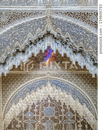 Intricate Islamic Architecture Arch With Muqarnas Plasterwork and Arabesque Carved Ornament, Alhambra, Granada 139600783