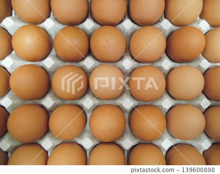 A row of eggs seen from the front. A row of eggs seen from the front. 139600898