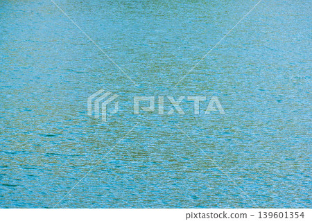 The lake sparkles in the spring sunshine. The lake sparkles in the spring sunshine. 139601354