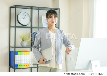 Young business woman in the office 139601663