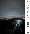 Illuminated from the foot of the mountain 139601795