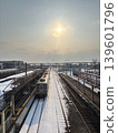 The setting sun in the northern country in winter 139601796