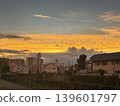sunset over a residential area 139601797