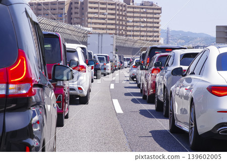 A heavily congested highway and line of cars A heavily congested highway and line of cars 139602005