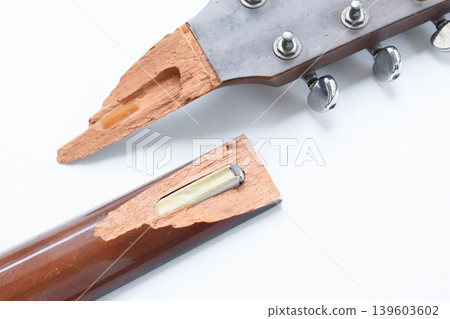 part of broken wood acoustic guitar isolated on white background 139603602