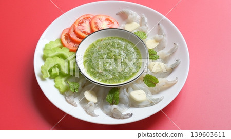 shrimp in fish sauce with Thai spicy seafood dipping sauce on white plate 139603611