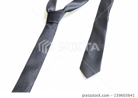 black necktie isolated on white background, father day concept and business style black necktie isolated on white background, father day concept and business style 139603641