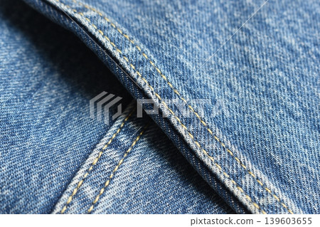 seam of blue denim texture background, jean fashion style seam of blue denim texture background, jean fashion style 139603655