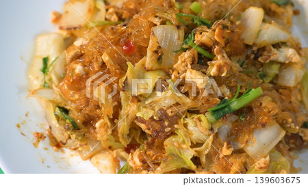 stir fried sukiyaki with egg and pork on white plate stir fried sukiyaki with egg and pork on white plate 139603675