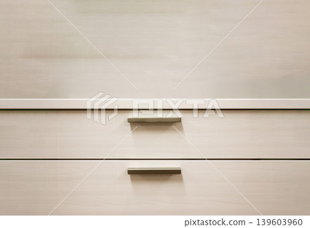 Close-up of a white storage unit with two drawers. Close-up of a white storage unit with two drawers. 139603960