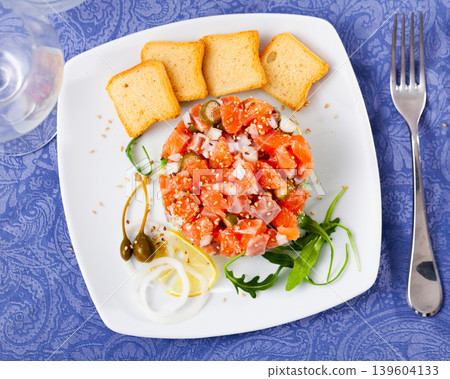 Salmon tartare with avocado served on plate Salmon tartare with avocado served on plate 139604133