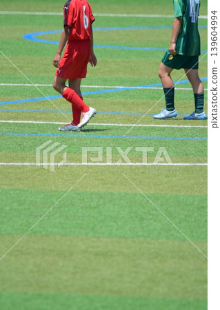 Soccer match, back view Soccer match, back view 139604994