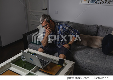 Freelancer concentrating on work from home Freelancer concentrating on work from home 139605330
