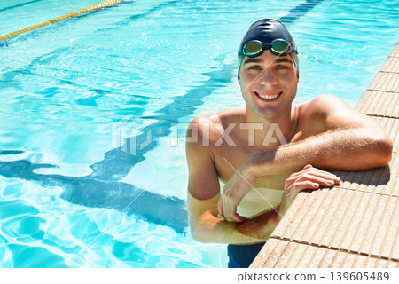 Swimming pool, happy and portrait of sports man for exercise, outdoor workout or training practice. Happiness, relax and waterpolo player smile after competition, fitness or cardio performance Swimming pool, happy and portrait of sports man for exercise, outdoor workout or training practice. Happiness, relax and waterpolo player smile after competition, fitness or cardio performance 139605489
