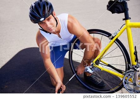 Man, portrait and cycling or tyre pump for repair puncture on road for safety, performance or transportation. Male person, face and bicycle gear problem fix for triathlon training, practice or sport 139605552
