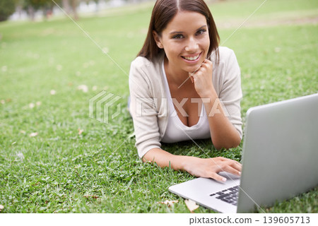 College student, portrait and woman with laptop in park on campus with research, project and education. University, person and studying on computer outdoor on lawn, grass or garden with happiness 139605713
