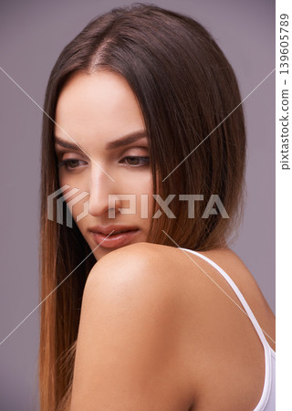 Thinking, shine and woman with hair care, glow and ideas on a grey studio background. Aesthetic, person and girl with confidence, grooming routine and salon treatment with shampoo, volume and keratin Thinking, shine and woman with hair care, glow and ideas on a grey studio background. Aesthetic, person and girl with confidence, grooming routine and salon treatment with shampoo, volume and keratin 139605789