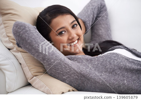 Relax, woman and sofa with portrait, smile and happy from nap and rest in the morning at home. Living room, lounge and couch with a female person from India on a break with peace and calm in house 139605879