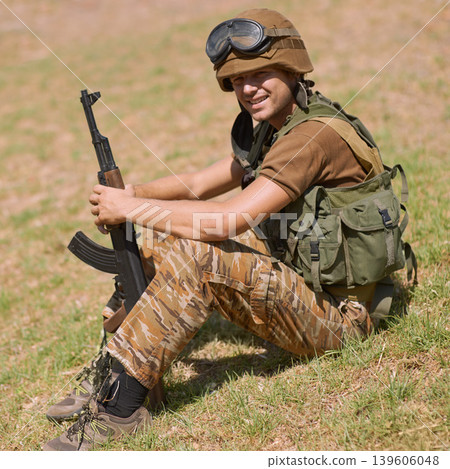 Military, smile and training with man and gun in nature for war, conflict and patriotism. Army, surveillance and security rifle with person and relax on grass for soldier, battlefield and veteran Military, smile and training with man and gun in nature for war, conflict and patriotism. Army, surveillance and security rifle with person and relax on grass for soldier, battlefield and veteran 139606048
