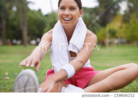 Fitness, park or happy woman stretching legs in running training, cardio exercise or outdoor workout. Nature, smile or healthy girl runner with towel, ready to start activity for wellness a slim body 139606152