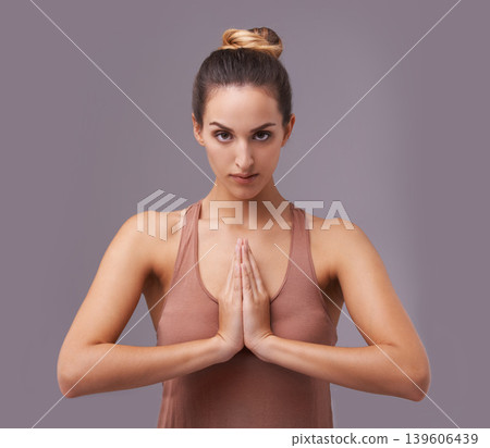 Prayer, portrait or woman in meditation in studio for wellness, peace or calm on grey background. Face, relax or zen female model in yoga pose for chakra energy, mental health or holistic breathing 139606439