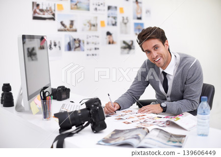 Man, camera and photography in agency with portrait, checking image design and creative in workplace. Person, smile face and glasses for vision, technology and focus in office with digital photoshoot 139606449