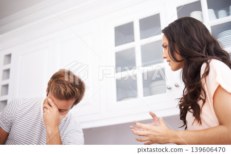 Couple, home and fight, angry and conflict with crisis in life, mistake or marriage fail with anxiety and stress. Frustrated people arguing in kitchen, cheating or problem with risk of divorce Couple, home and fight, angry and conflict with crisis in life, mistake or marriage fail with anxiety and stress. Frustrated people arguing in kitchen, cheating or problem with risk of divorce 139606470