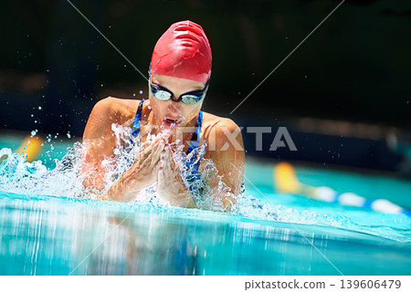 Workout, water splash or woman in swimming pool for competition training, fitness or energy. Sports, fast speed or cardio with female swimmer and athlete for exercise, championship and race at gala Workout, water splash or woman in swimming pool for competition training, fitness or energy. Sports, fast speed or cardio with female swimmer and athlete for exercise, championship and race at gala 139606479