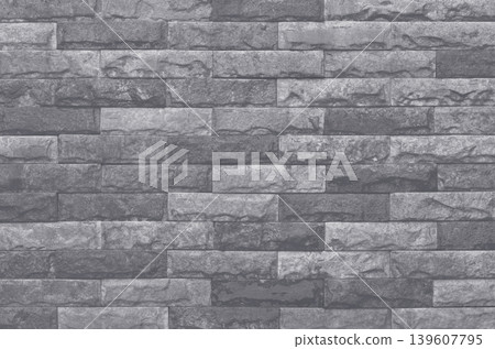 Old black grey brick wall texture with vintage style for background and design art work. Old black grey brick wall texture with vintage style for background and design art work. 139607795