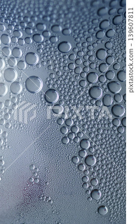 Many silver bubbles in water close up 139607811