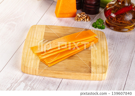 Yellow cheddae cheese slices snack Yellow cheddae cheese slices snack 139607840