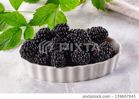 Raw sweet juicy blackberry in the bowl Raw sweet juicy blackberry in the bowl 139607845