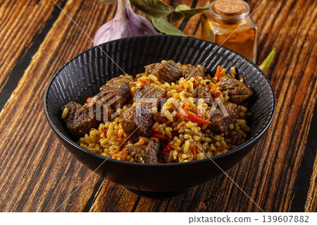 Asian traditional pilaf with beef 139607882