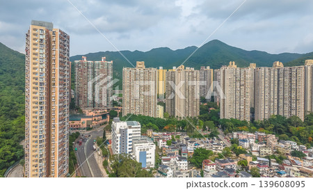 Sha Tin residential towers beside green mountains skyline Sha Tin residential towers beside green mountains skyline 139608095