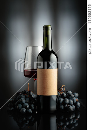 Red wine and juicy blue grapes. Red wine and juicy blue grapes. 139608136