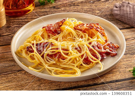 Italian classic spaghetti carbonara with bacon and egg Italian classic spaghetti carbonara with bacon and egg 139608351