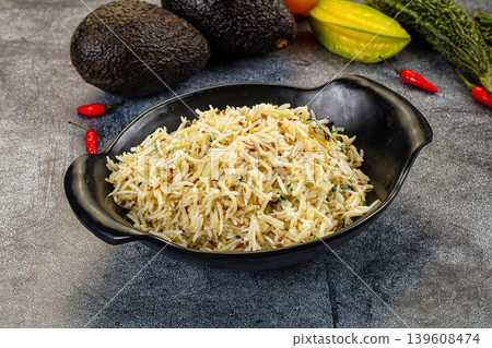 Aromatic Cumin Rice in a Bowl with Exotic Fruits and Vegetables Aromatic Cumin Rice in a Bowl with Exotic Fruits and Vegetables 139608474