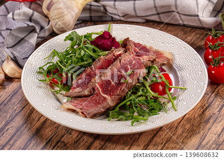 Gourmet Roast Beef Slices Fresh Arugula Salad Cherry Tomatoes Garlic Chili Pepper 139608632
