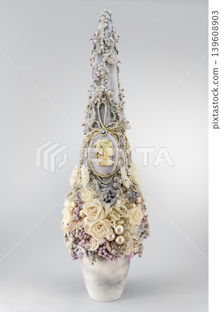 Christmas tree table handmade arrangement mini decoration for new year artificial on white background isolated Christmas tree table handmade arrangement mini decoration for new year artificial on white background isolated 139608903