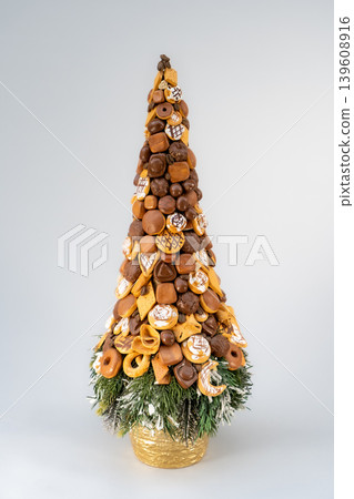 Christmas tree table handmade arrangement mini decoration for new year artificial on white background isolated Christmas tree table handmade arrangement mini decoration for new year artificial on white background isolated 139608916