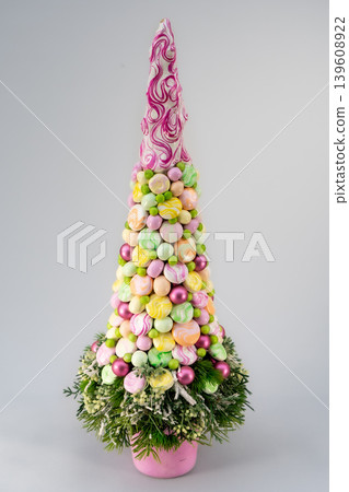 Christmas tree table handmade arrangement mini decoration for new year artificial on white background isolated Christmas tree table handmade arrangement mini decoration for new year artificial on white background isolated 139608922