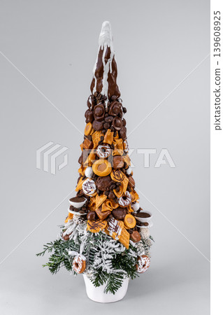 Christmas tree table handmade arrangement mini decoration for new year artificial on white background isolated Christmas tree table handmade arrangement mini decoration for new year artificial on white background isolated 139608925
