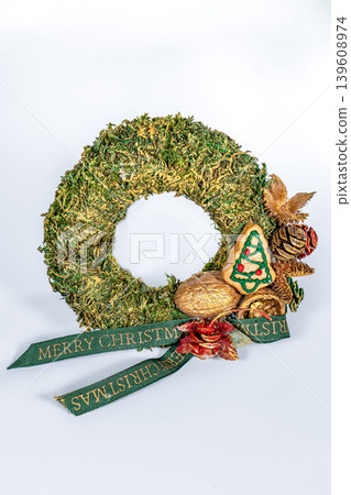 Christmas wreath candle candle gingerbread tree white snow isolated Christmas wreath candle candle gingerbread tree white snow isolated 139608974
