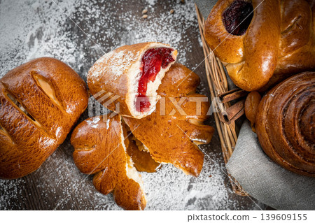 Fresh pastries buns wicker basket rustic style bakery 139609155