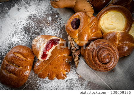 Fresh pastries buns wicker basket rustic style bakery Fresh pastries buns wicker basket rustic style bakery 139609156