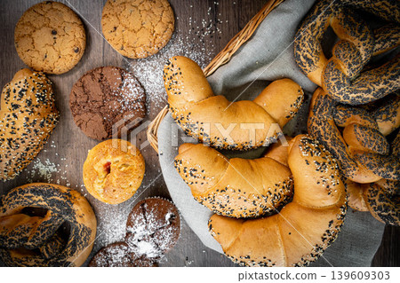 Fresh pastries buns wicker basket rustic style bakery 139609303